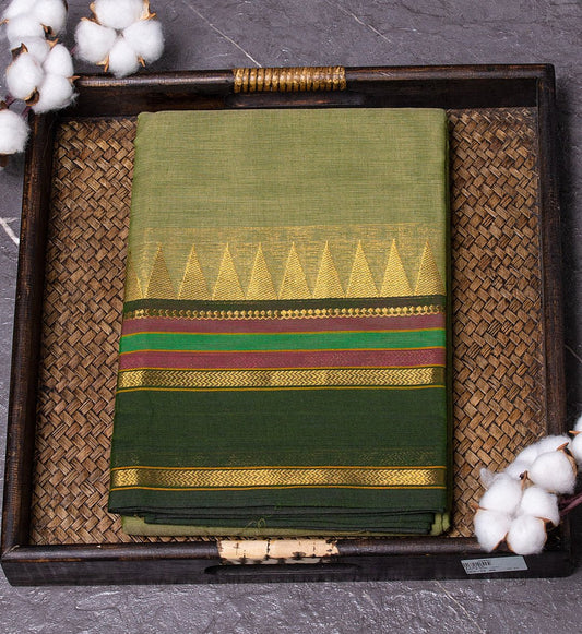 Radiant and Traditional: Moss Green Chettinad Saree with Bottle Green and Pink Striped Temple Border. - swadeshsouq.com