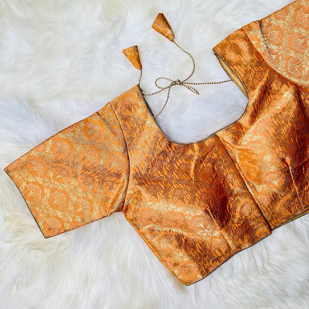 Radiant Regality: The Light Orange Brocade Blouse with Golden Floral Patterns. - swadeshsouq.com