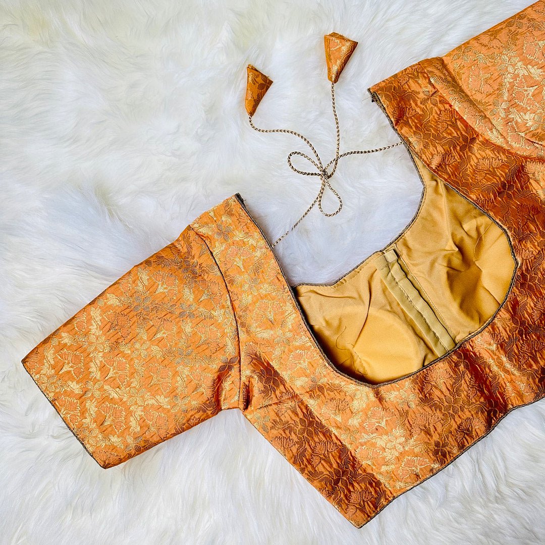 Radiant Regality: The Light Orange Brocade Blouse with Golden Floral Patterns. - swadeshsouq.com