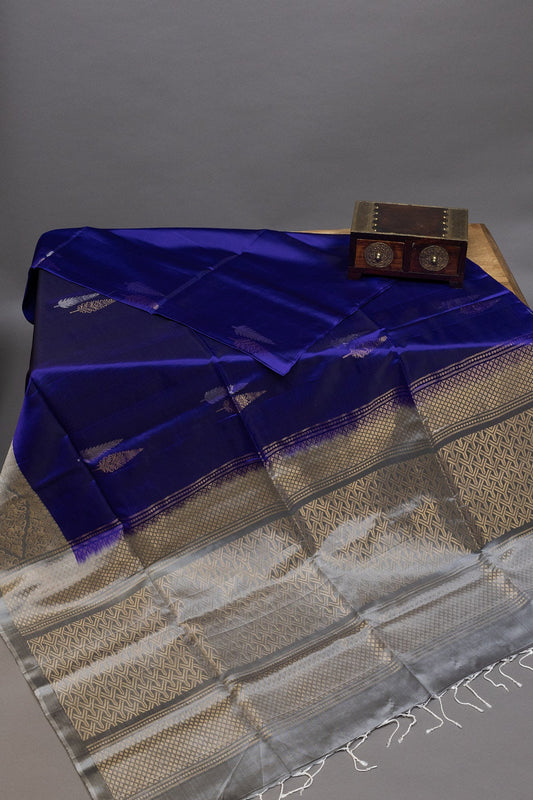 REGAL ELEGANCE: ROYAL BLUE AND SILVERISH GREY KANJIEEARAM SILK SAREE WITH SILVER ZARI BORDERS - swadeshsouq.com