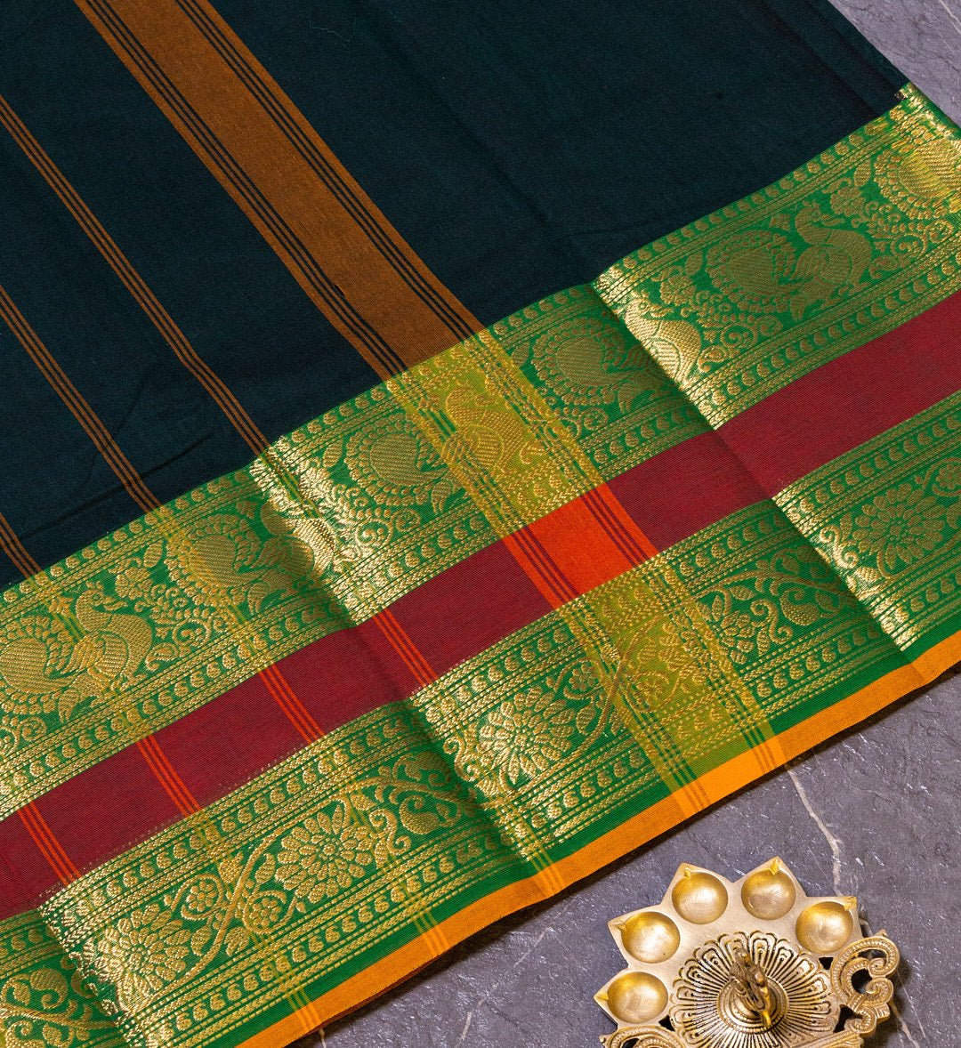 Regal Finesse: Bottle Green Chettinad Cotton Saree with Intricate Long Border Detailing - swadeshsouq.com