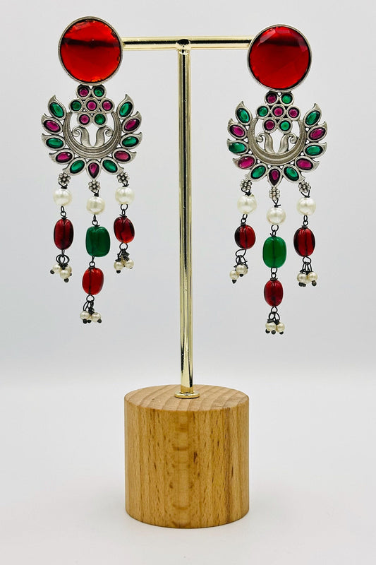 Ruby & Emerald Radiance: Silver Dangler Earrings with Red and Green Stones - swadeshsouq.com