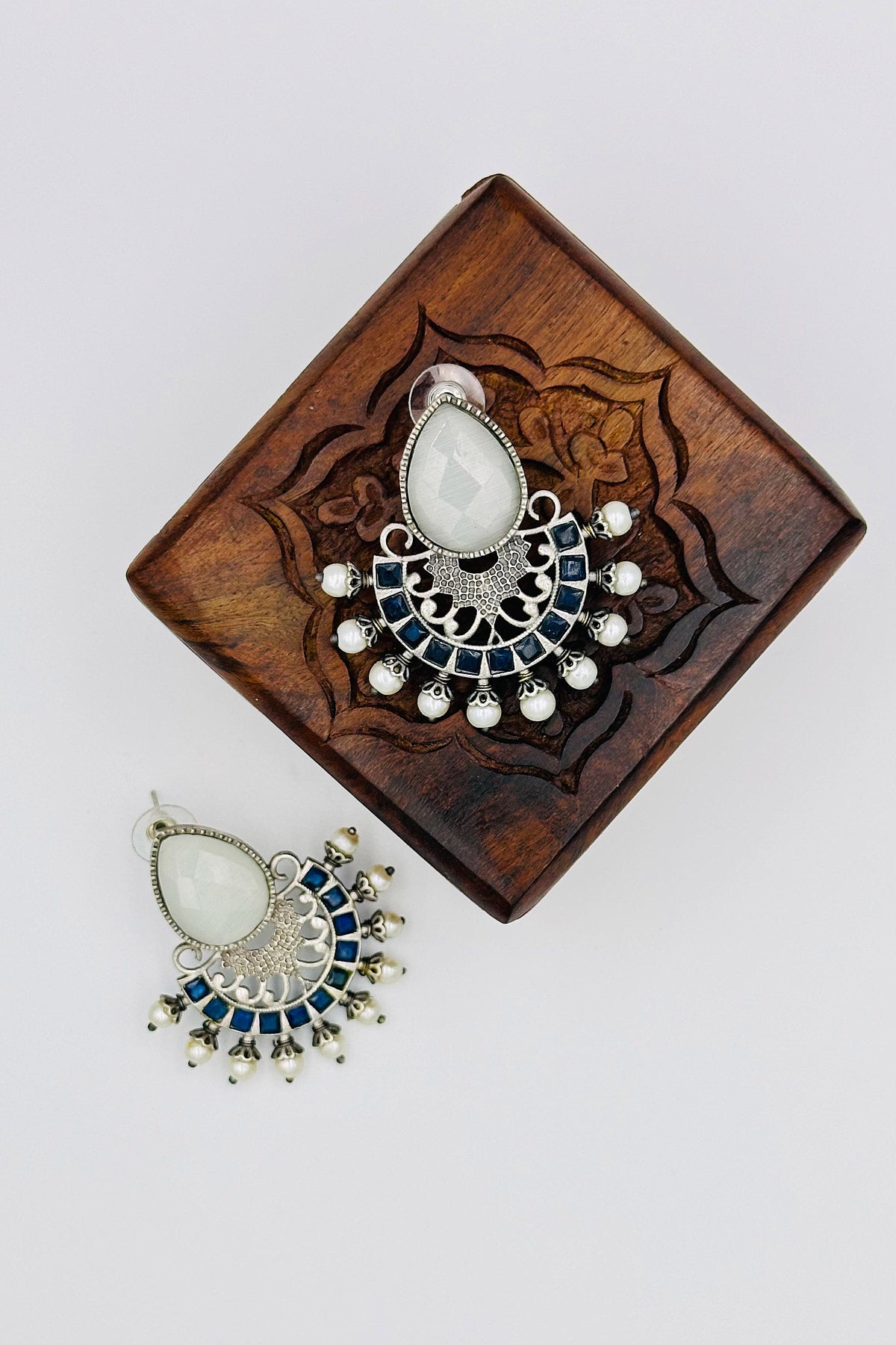 Silver Earrings Adorned with Intricate Blue and White Pearls and Stones - swadeshsouq.com