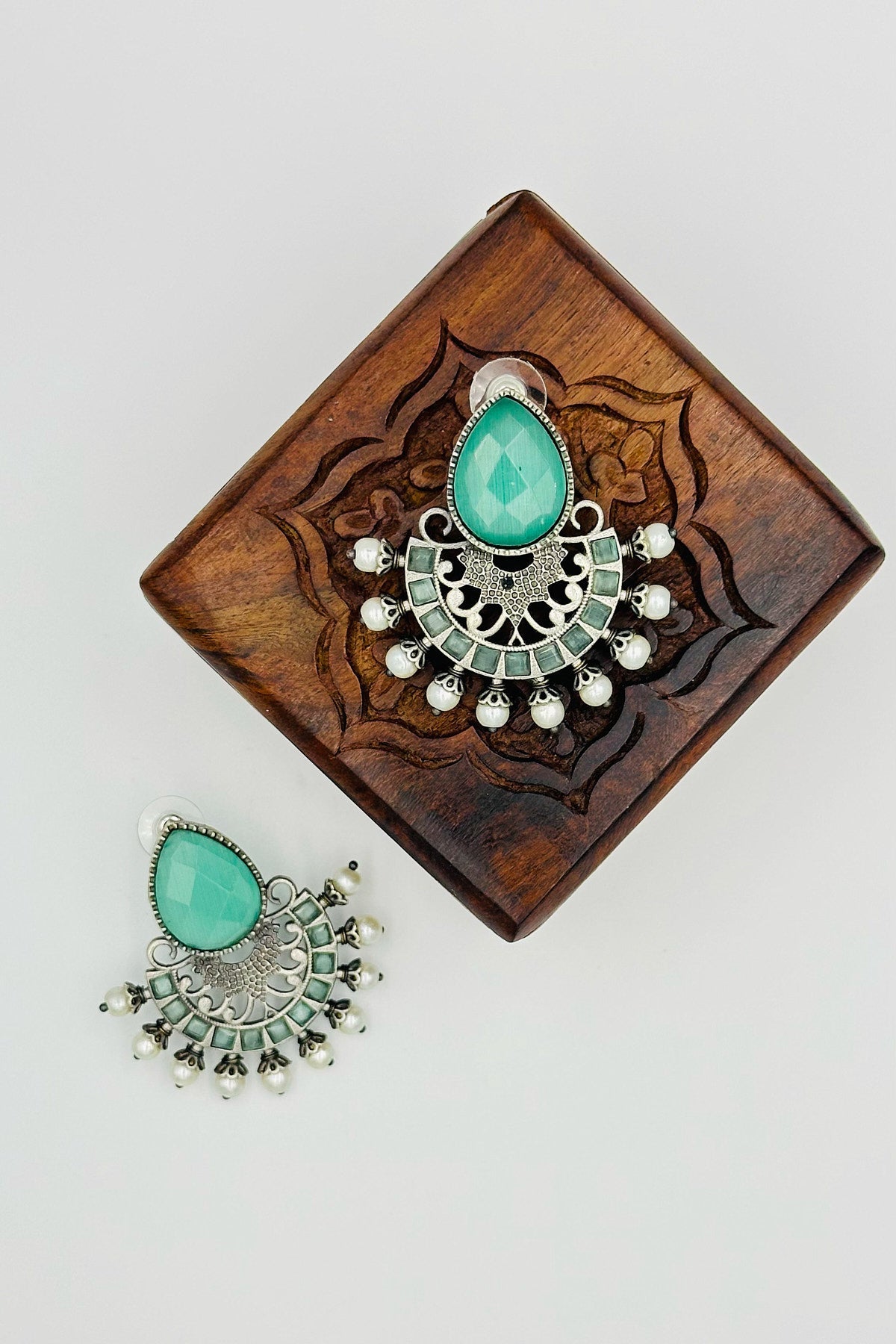 Silver Earrings Adorned with Intricate Turquoise Blue Pearls and Stones - swadeshsouq.com