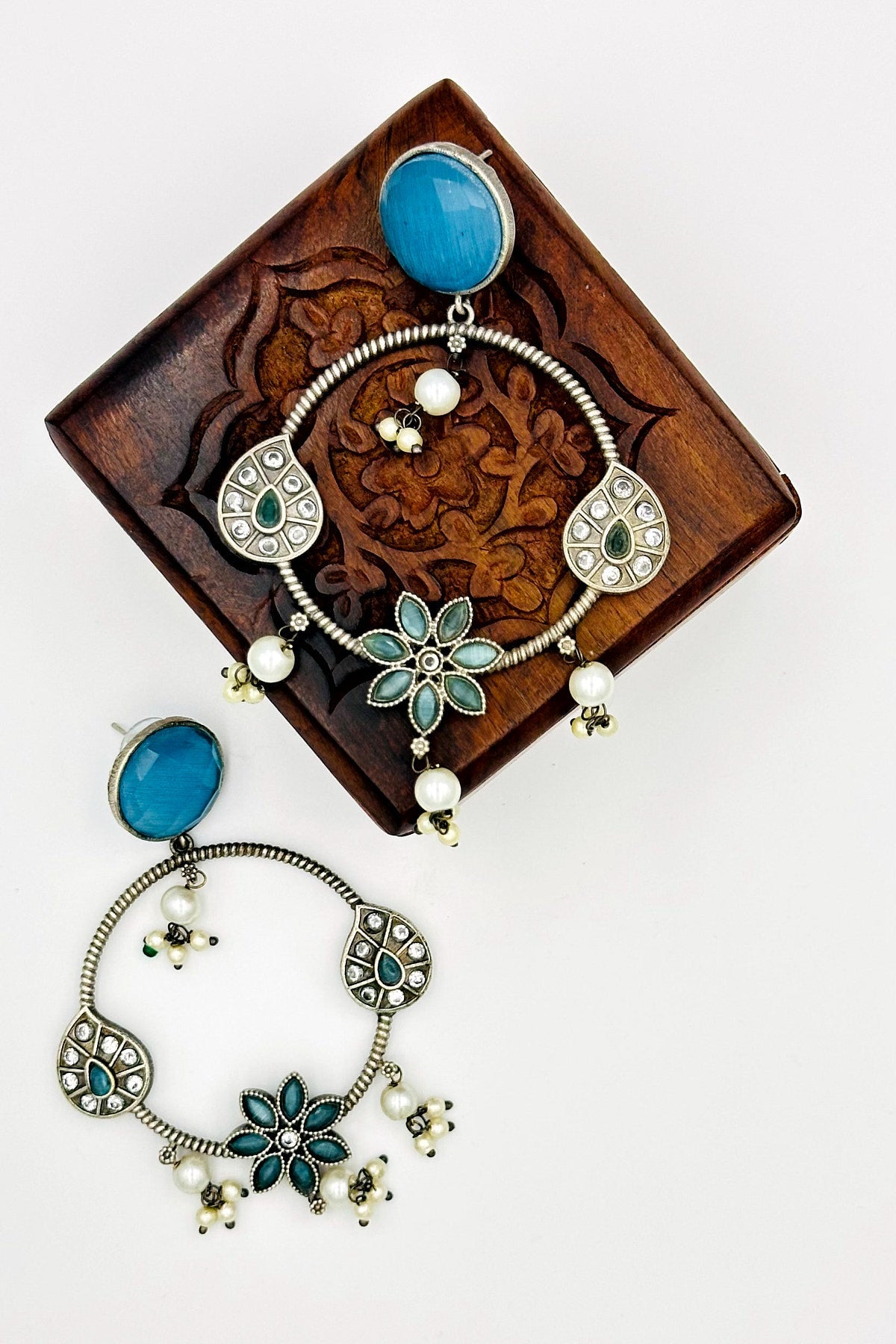 Silver Floral Danglers with Blue Gems - swadeshsouq.com