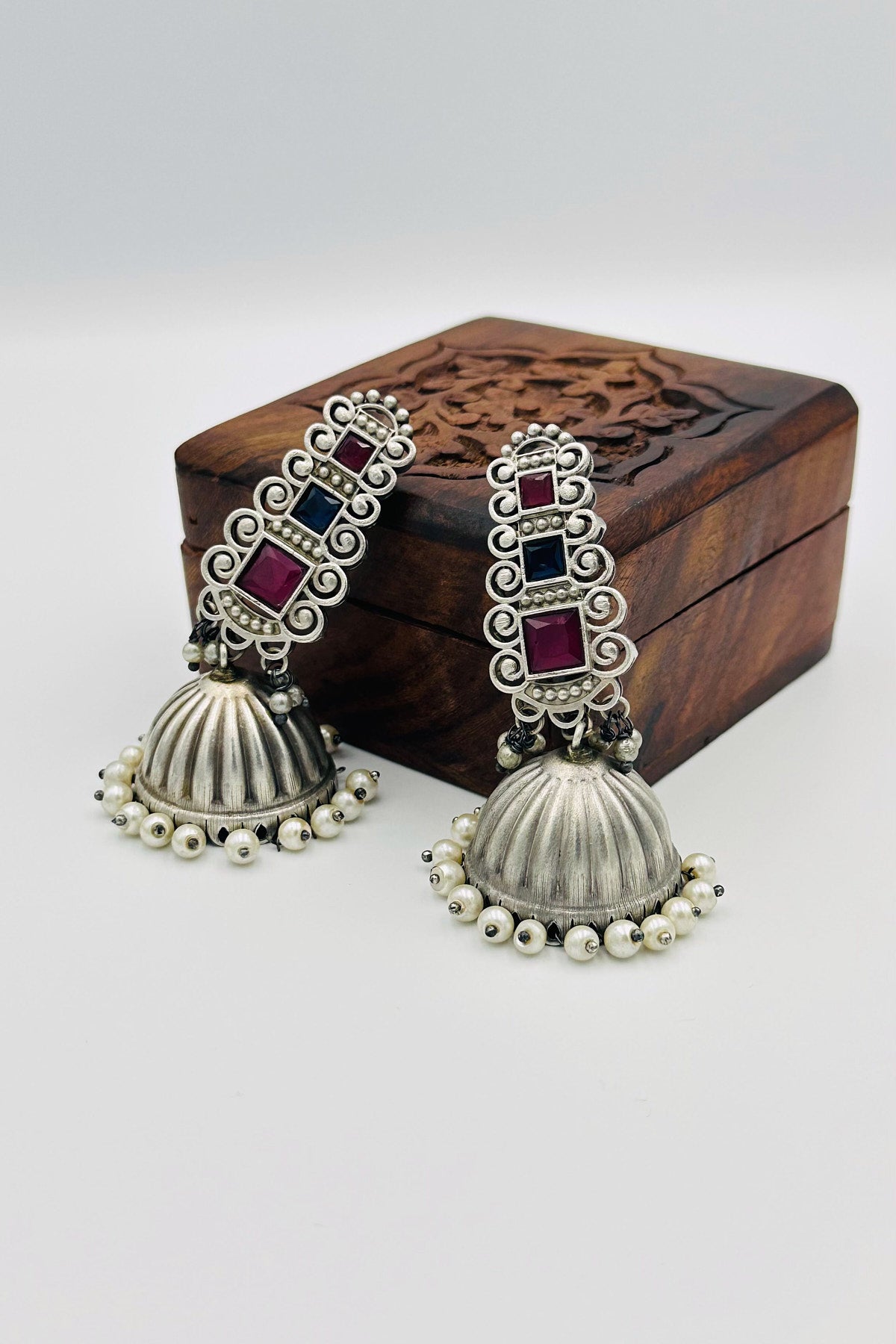 Silver Jhumkas Adorned with Enchanting Blue and Pink Stones - swadeshsouq.com