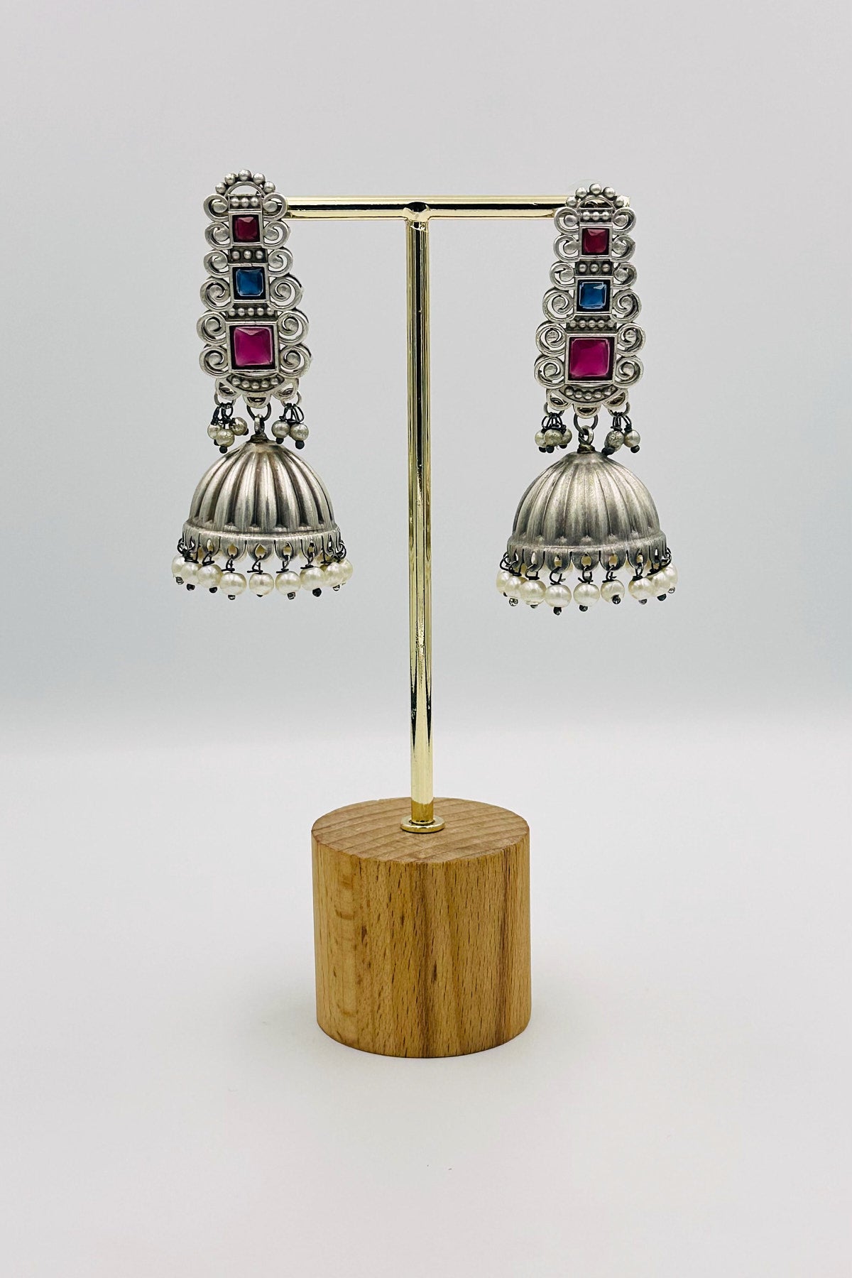 Silver Jhumkas Adorned with Enchanting Blue and Pink Stones - swadeshsouq.com