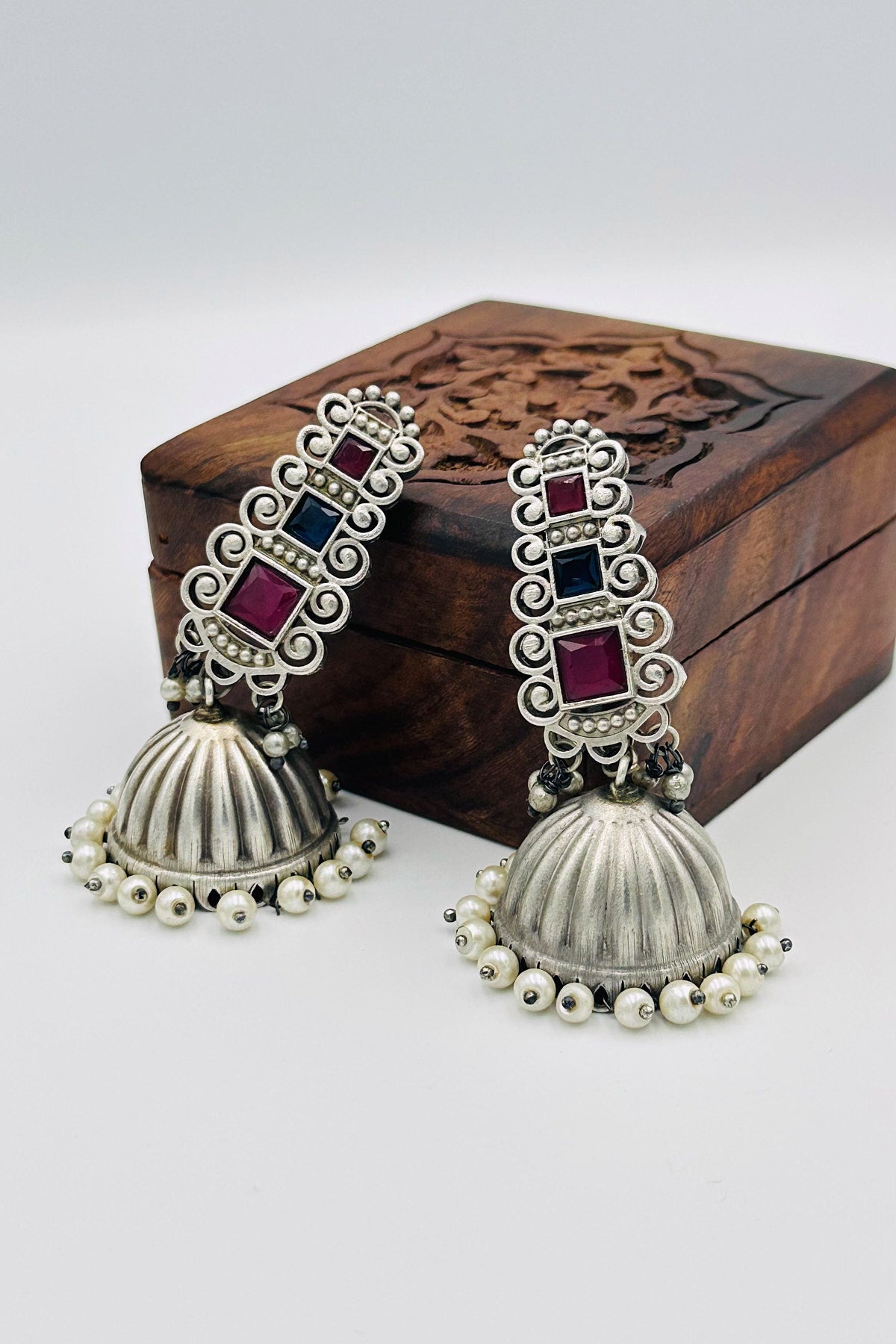 Silver Jhumkas Adorned with Enchanting Blue and Pink Stones - swadeshsouq.com