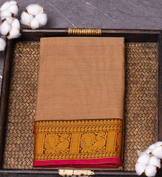 Embrace subtle elegance with Golden Wheat Coloured Saree w/ Pink & Brown Thread Border from swadeshsouq.com.