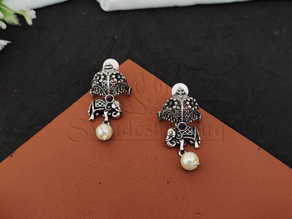 Swinging Pearl Oxidised Silver Earrings - A Playful Fusion of Elegance and Whimsy. - swadeshsouq.com