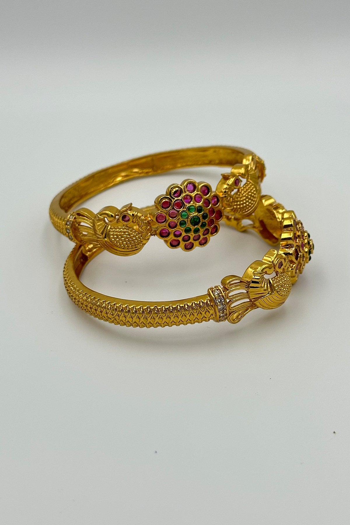 The Peacock Design Kada Bangles with Kemp Stone Embellishments. - swadeshsouq.com