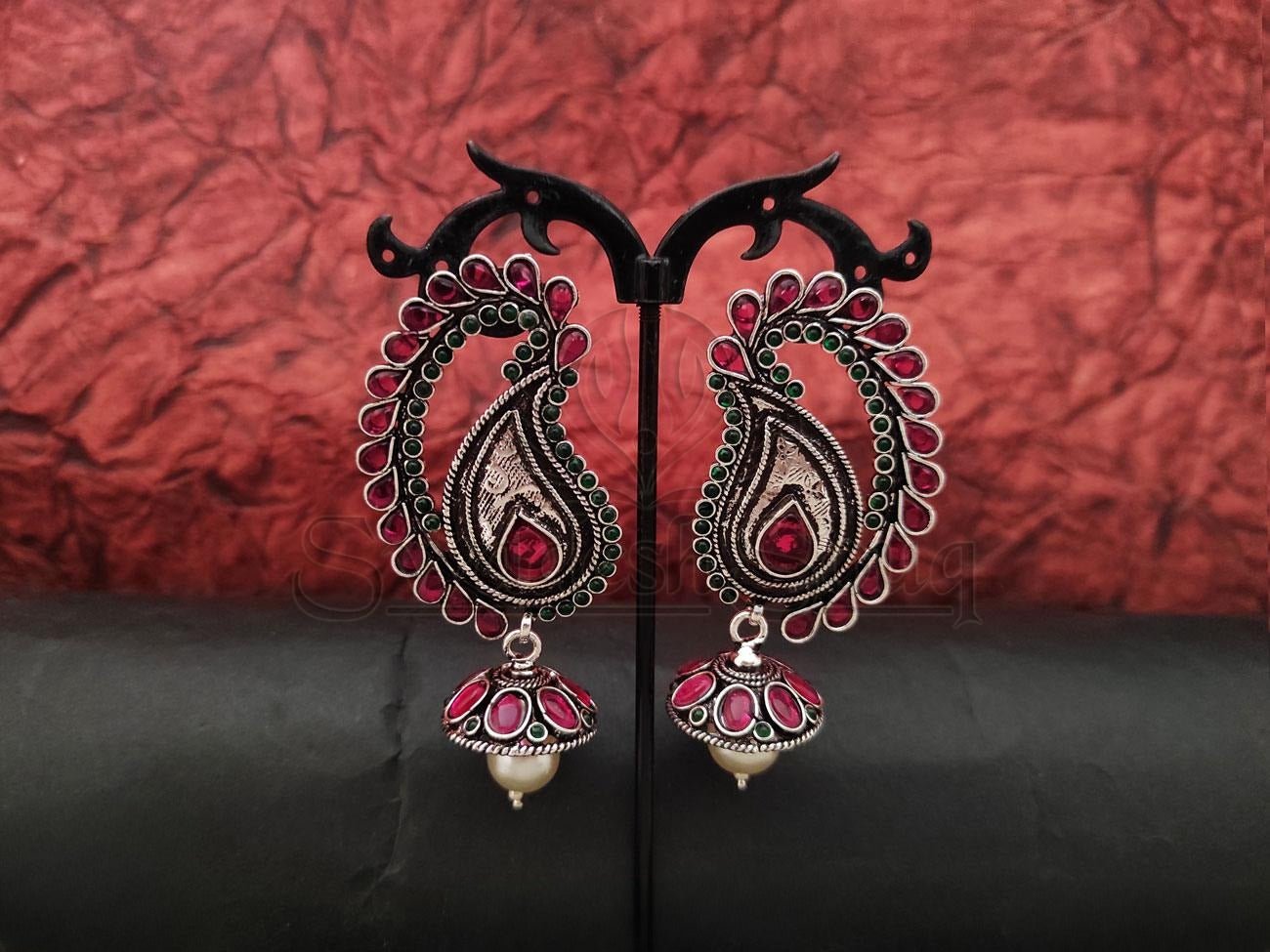 Timeless Charm: Oxidized Silver Jhumkas Embellished with Ruby and Emeralds. - swadeshsouq.com