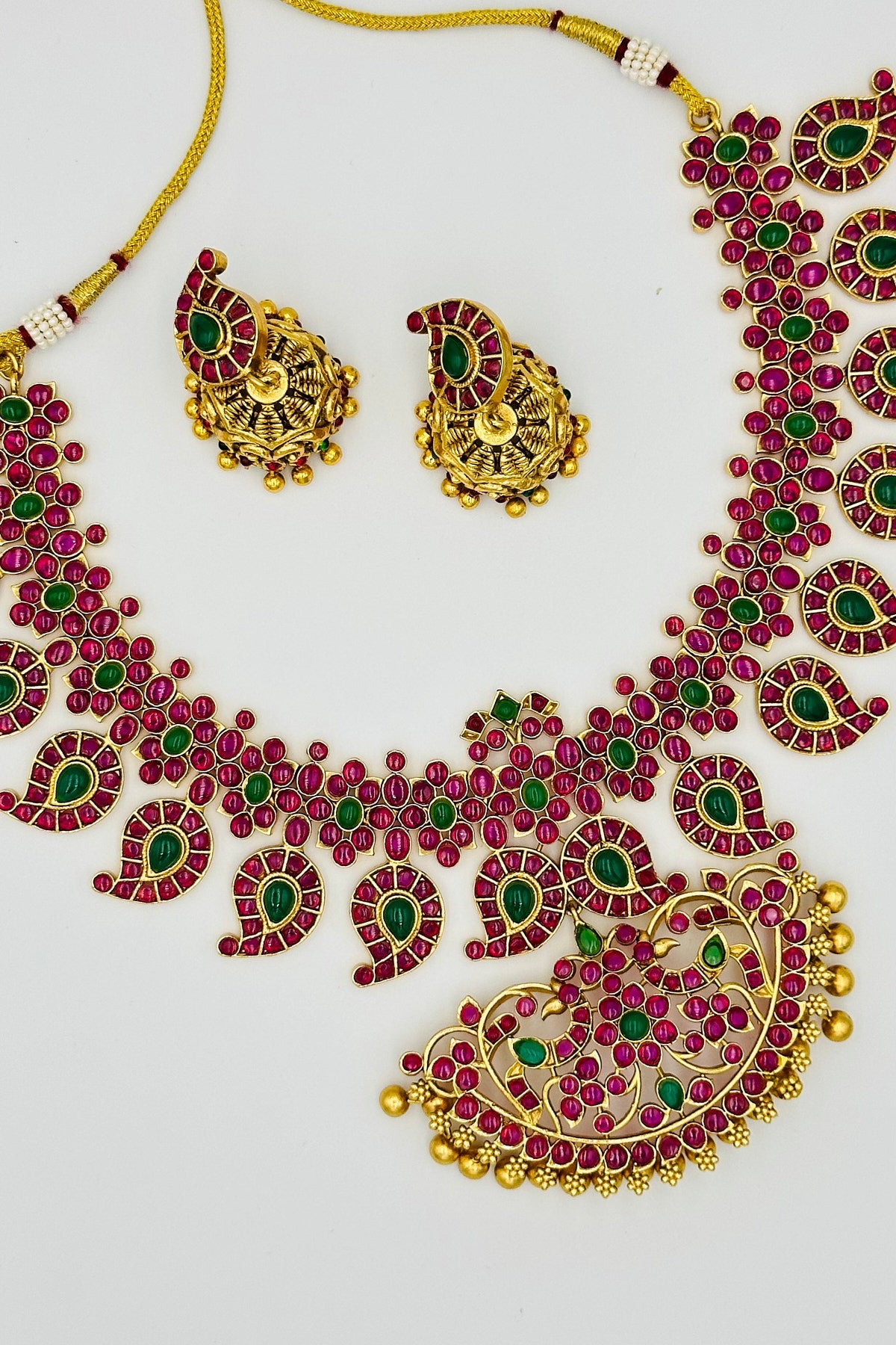 Timeless Elegance: The Exquisite Temple Motif Necklace and Jhumka Set. - swadeshsouq.com