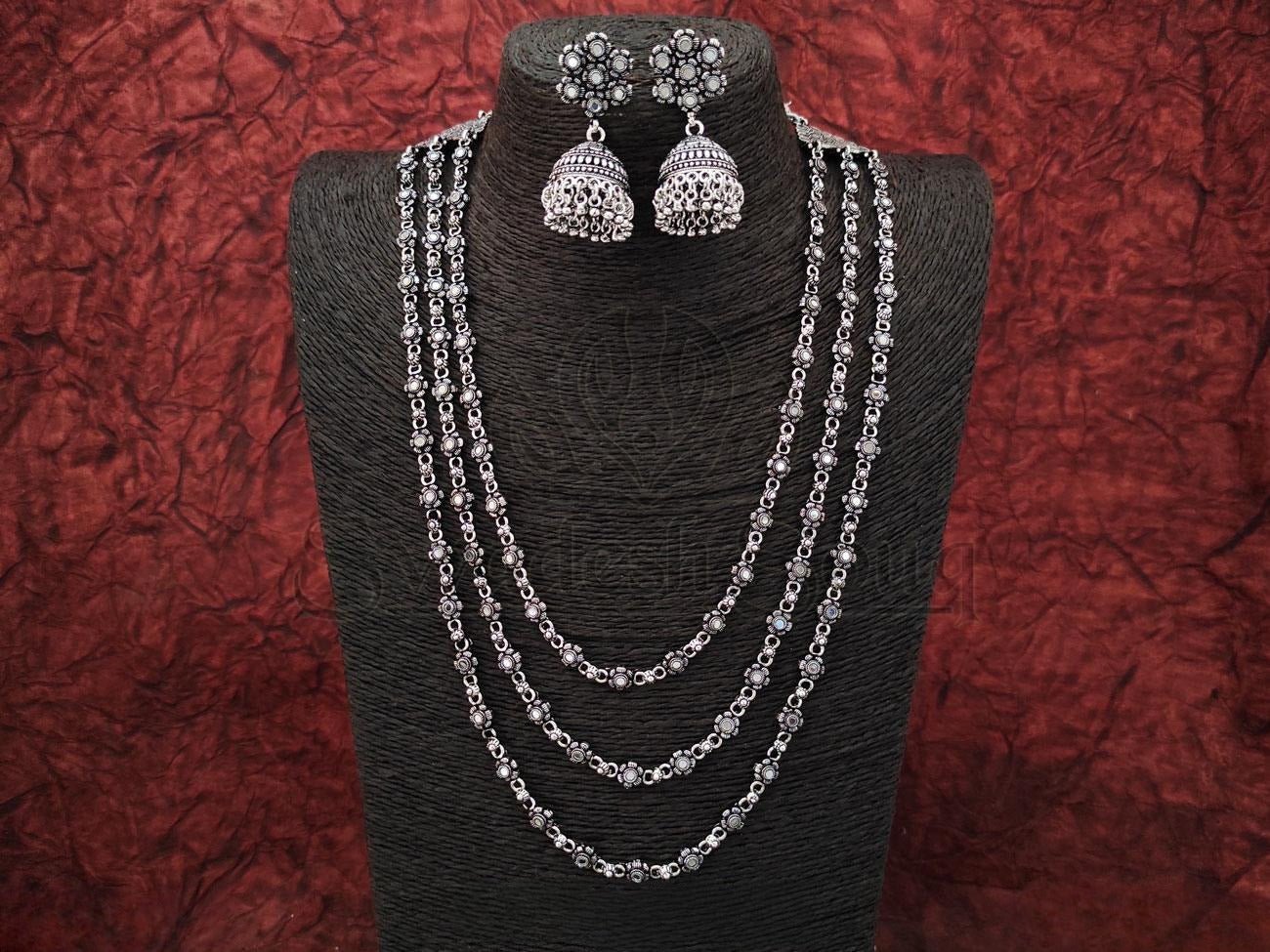 Unleash Your Inner Elegance with our Multi-Stranded Oxidized Silver Necklace and Jhumka Set. - swadeshsouq.com