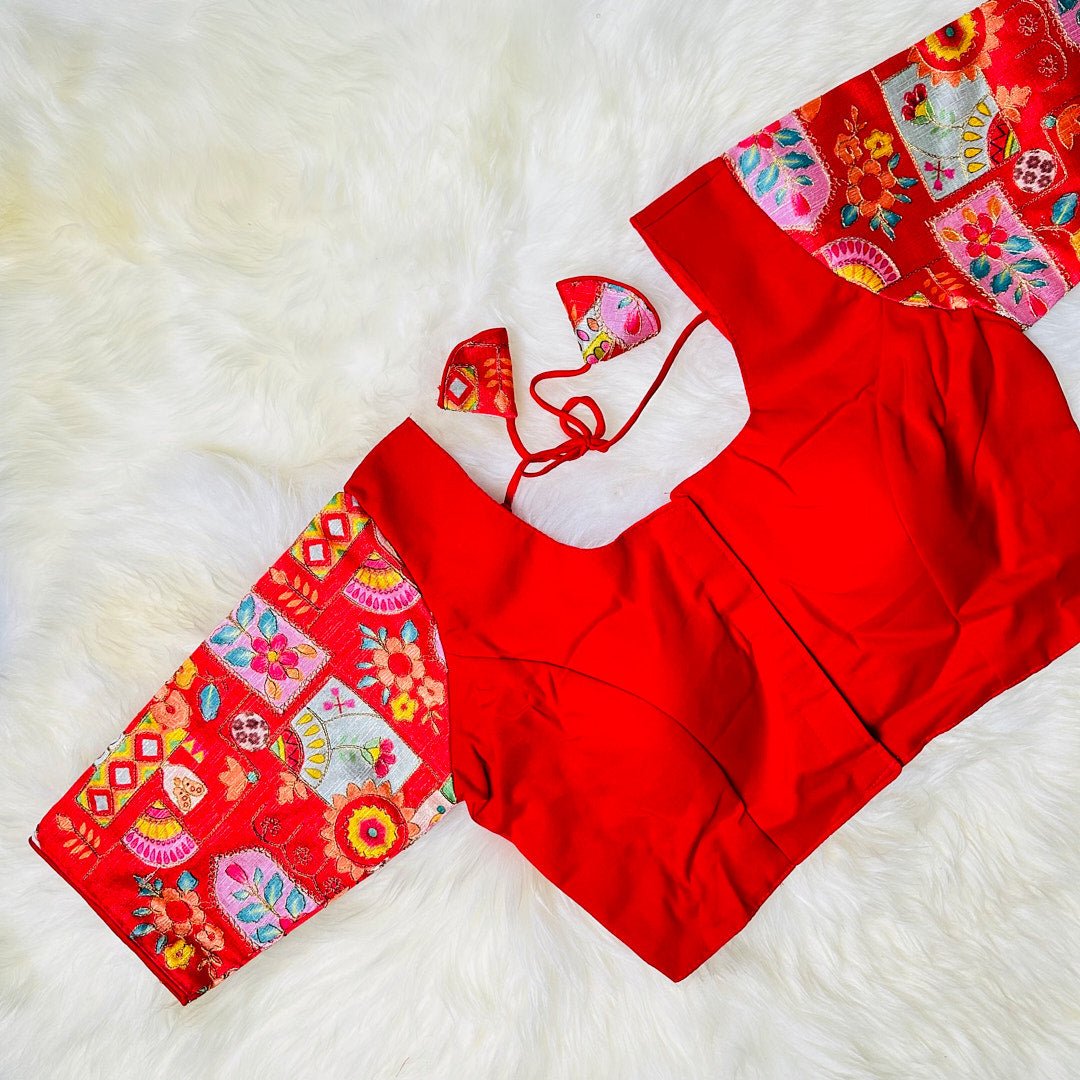 write a brief and elegant description for red blouse with contrast sleeves with beautiful design. - swadeshsouq.com